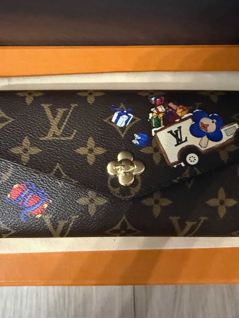 Louis Vuitton Brown Monogram Sarah Wallet Holiday 2025